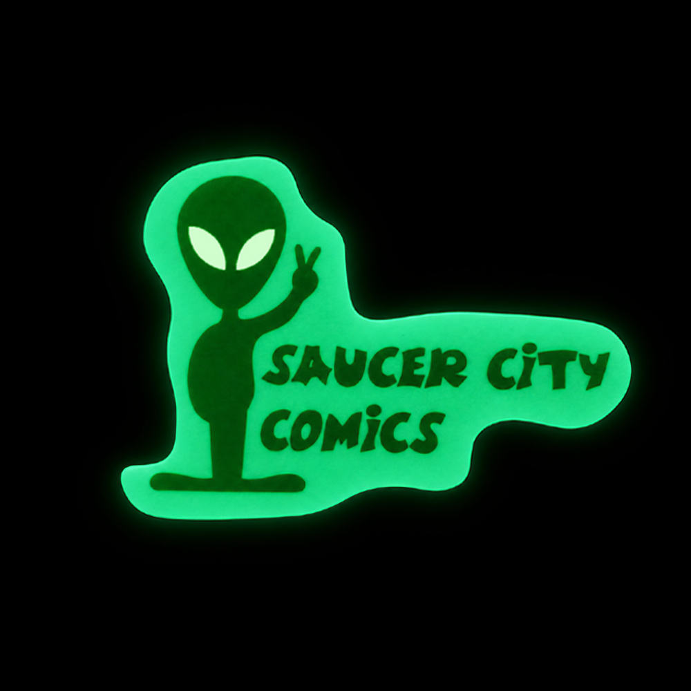 Custom die-cut glow in the dark sticker glowing green