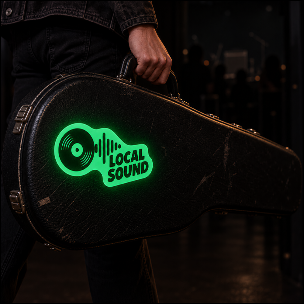 Glow in the dark band sticker on a guitar case